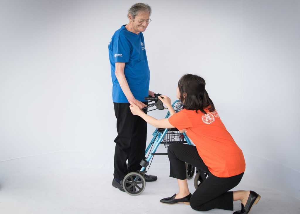 Roberto with his rollator at a follow-up appointment