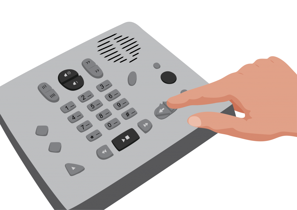 A hand pressing a button on an audio player