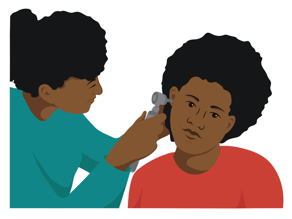 Mere having her ears checked by a service provider. The service provider is looking closely into Mere’s ears with a small device.