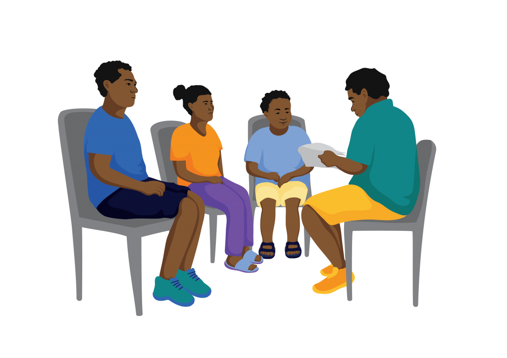 A support worker leads an assessment interview with Michael and his parents. They all sit in a group.