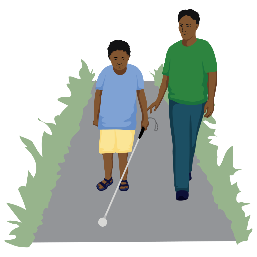 A service provider teaching Michael how to use his white cane to walk outside. Michael is holding his cane and his teacher is walking beside him.