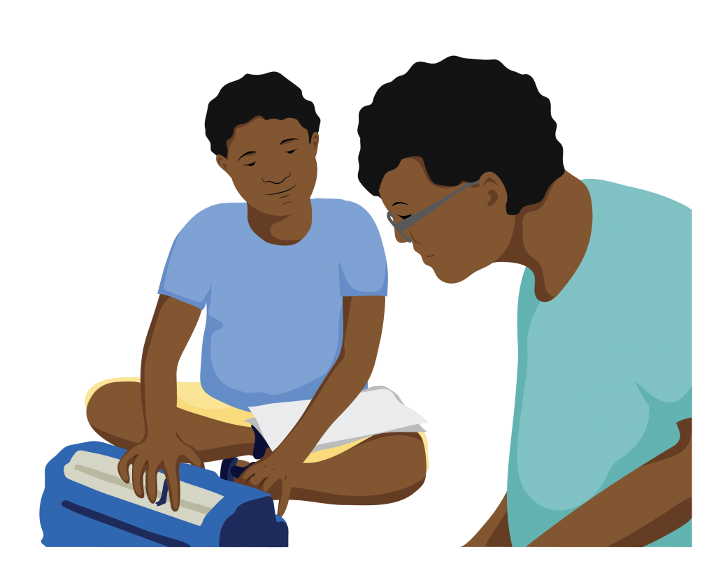 Michael sitting using a braille typewriter as his teacher looks on