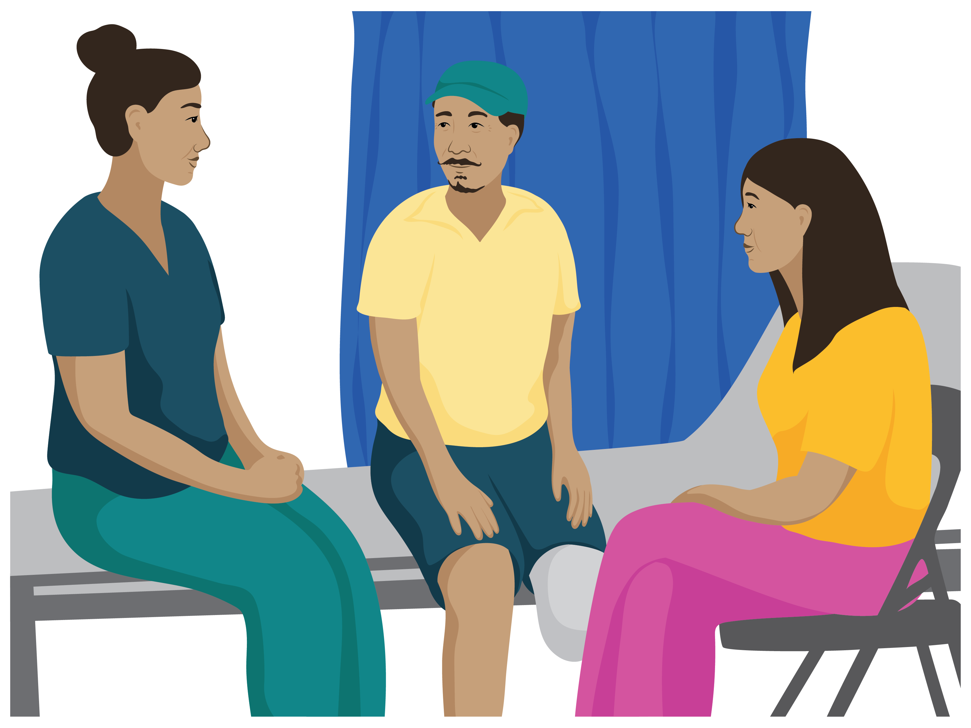 A man with a lower limb amputation sits on a clinic bed, he is talking to two women who sit with him.
