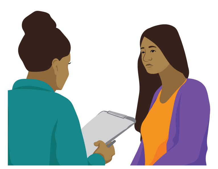 Lola, a woman, speaks to another woman holding a clipboard and pen.