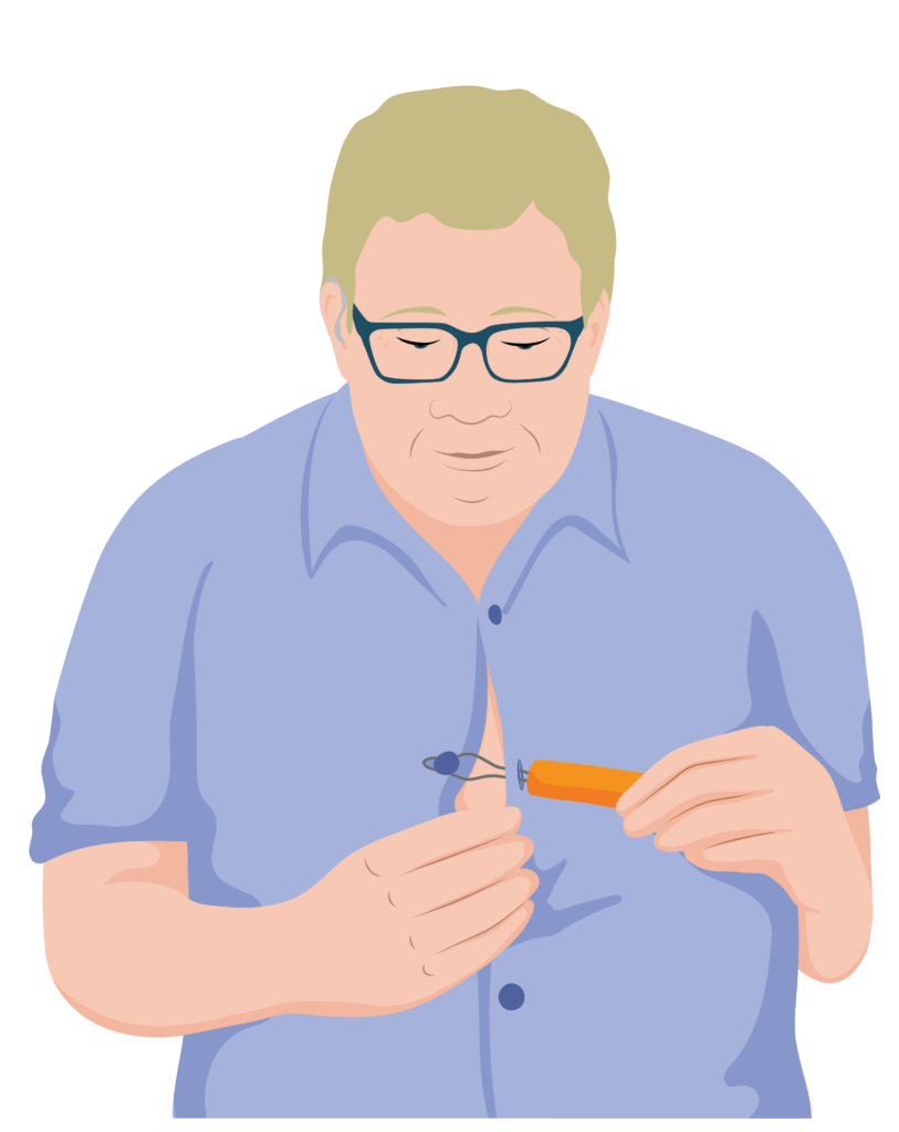 Samuel uses a button hook to button his shirt. The diamond shaped hook is placed through the buttonhole on one side of his shirt and over the button on the other.