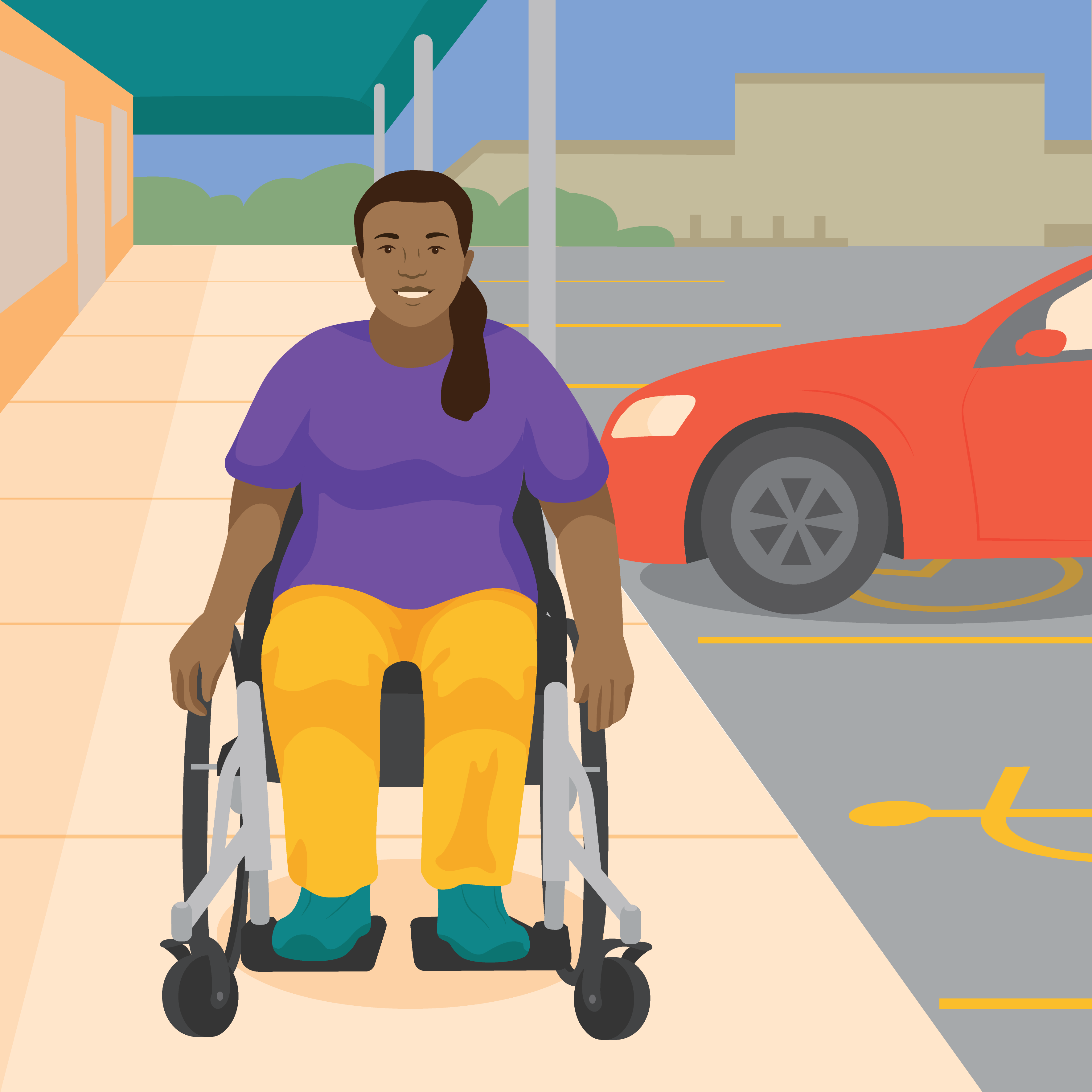 Ejaz, a young woman, uses a wheelchair on the path next to a car park.