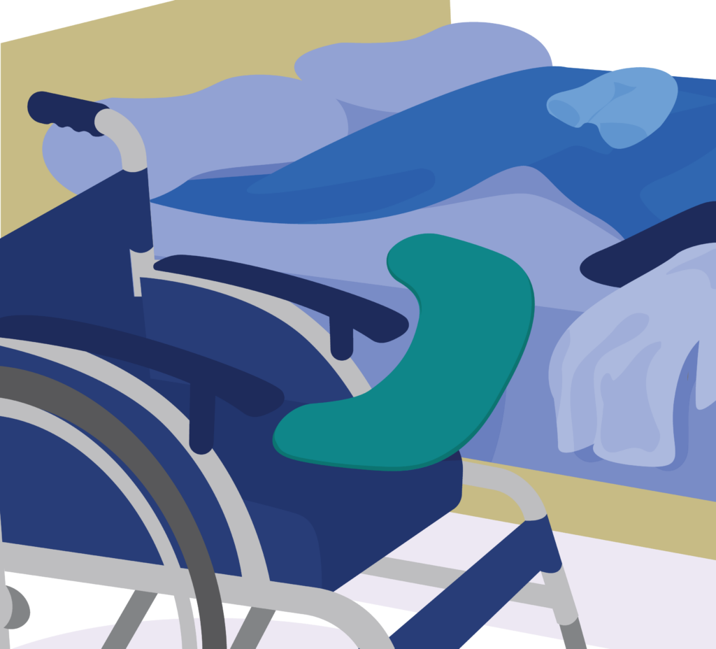Malu’s wheelchair next to his bed with curved transfer board positioned between the surfaces. The board is on a slope.