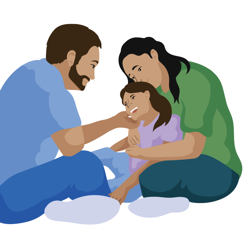 Ishadi, a young girl with her mum and dad.