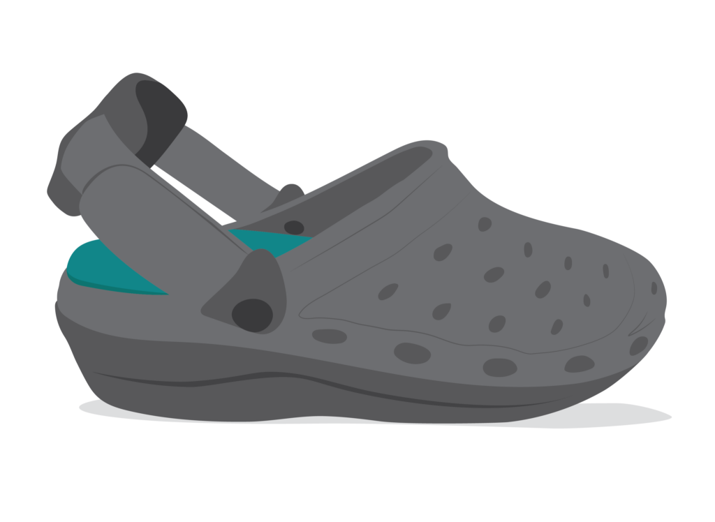 An open heeled plastic shoe with holes in the upper and adjustable heel strap.