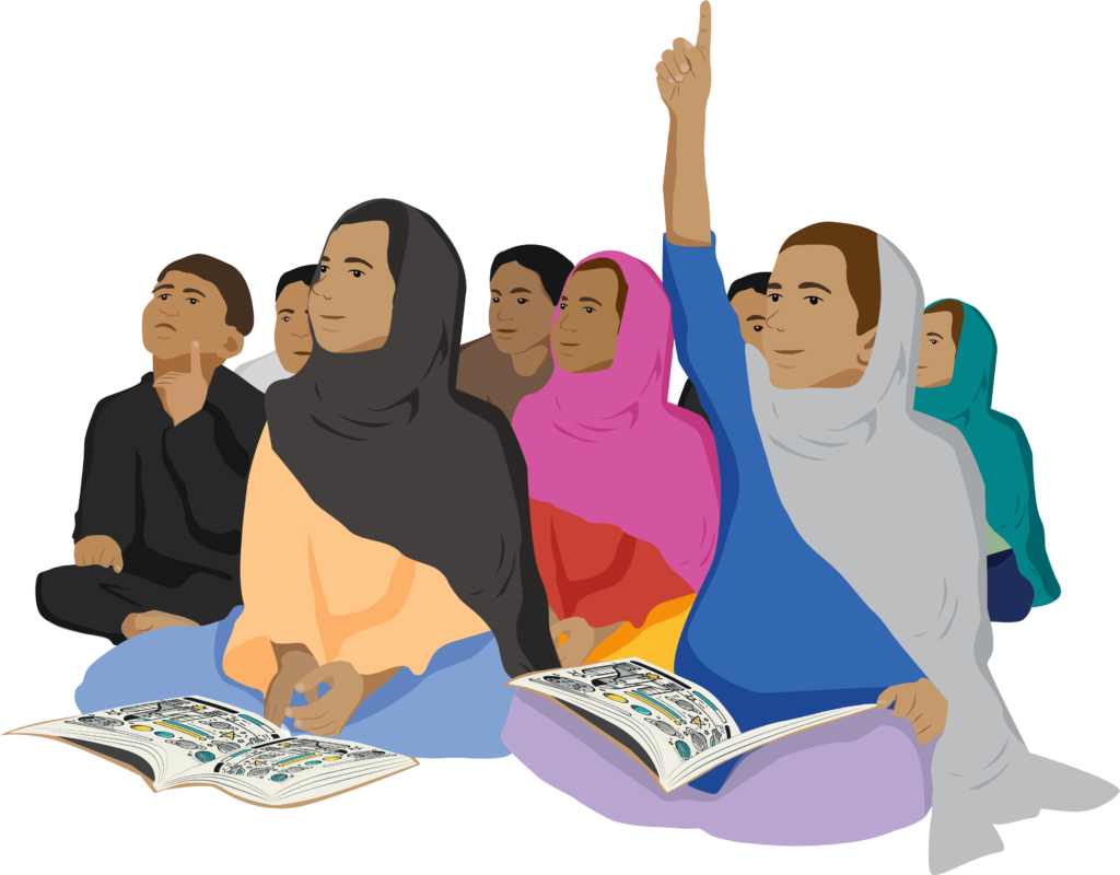 Children sitting on the floor. Anju has her hand raised and has a book open on her lap.