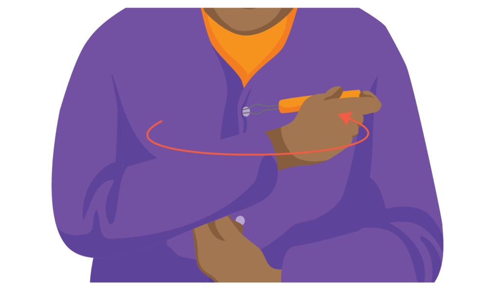 A person holds a button hook in their right hand. They cross their arm over to the other side. The narrower part of the diamond shaped hook holds the button.